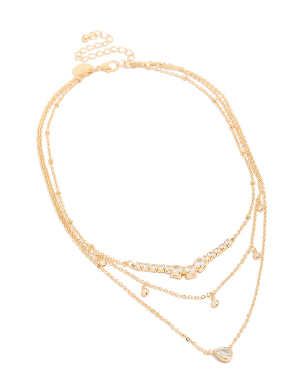 Featuring a gold plated cubic zirconia tennis and pendant layered necklace with charm in dainty style front view