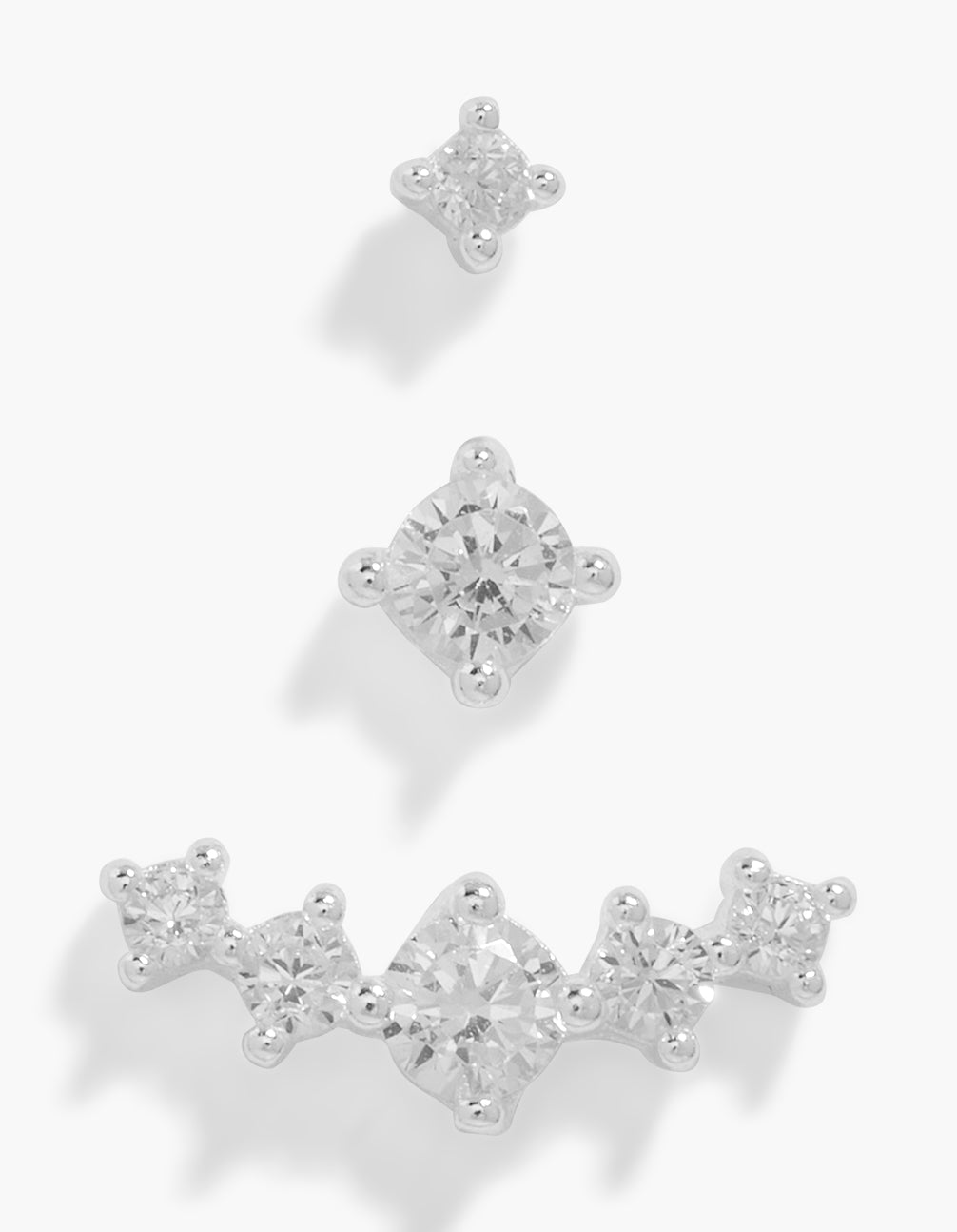 Featuring crawler and flat back stud earrings in sterling silver with cubic zirconia front view