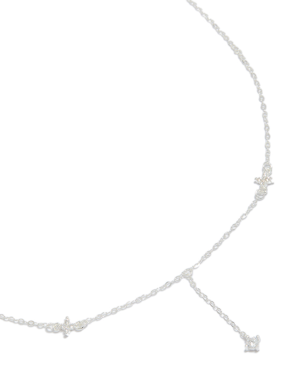 Introducing a dainty sterling silver cubic zirconia flower Y-necklace in silver close up view