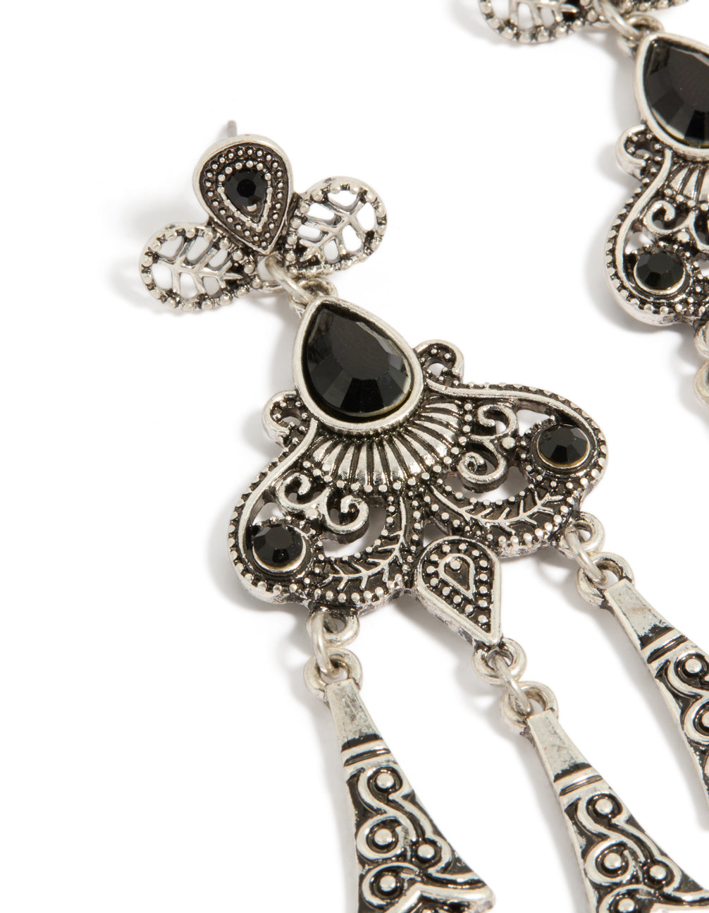Featuring statement details in silver and black diamante boho drop earrings close up view