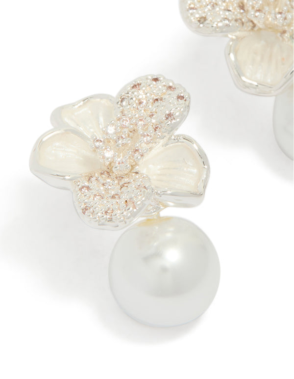Elegant silver plated cubic zirconia flower and pearl drop earrings close up view