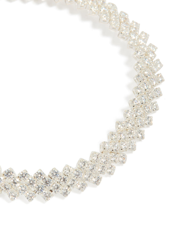 Highlighting the diagonal round cubic zirconia pattern of this silver plated bracelet close up view