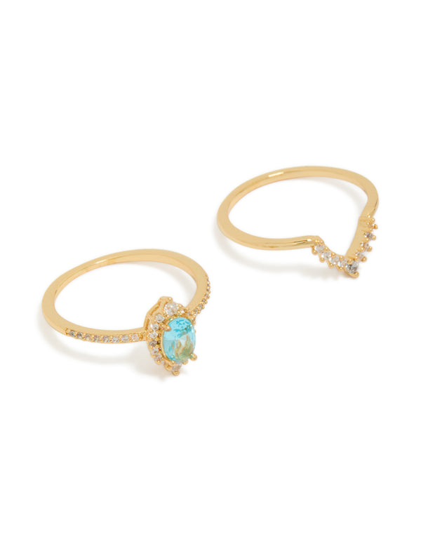 Showcasing gold plated cubic zirconia pear and crown stacking rings in a 2-pack with crystal, aqua, and clear accents front view