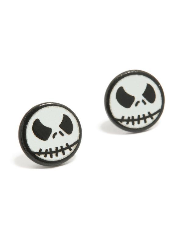 Showcasing black coated metal skeleton face stud earrings in chunky style and white accents front view