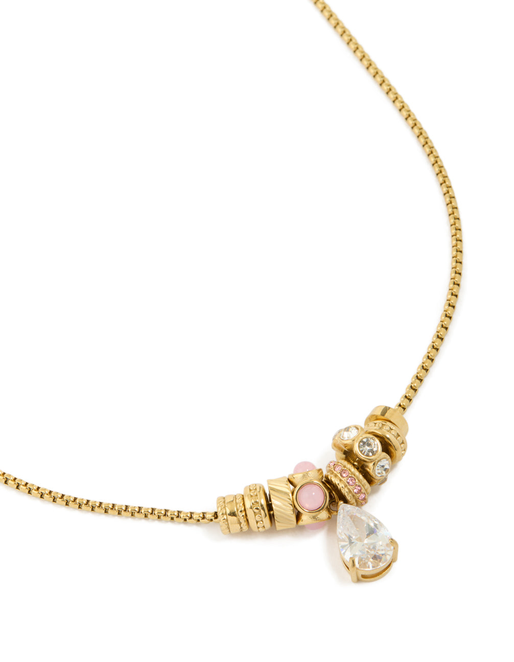 Showcasing a waterproof beaded necklace with pear cut cubic zirconia in gold plated stainless steel close up view