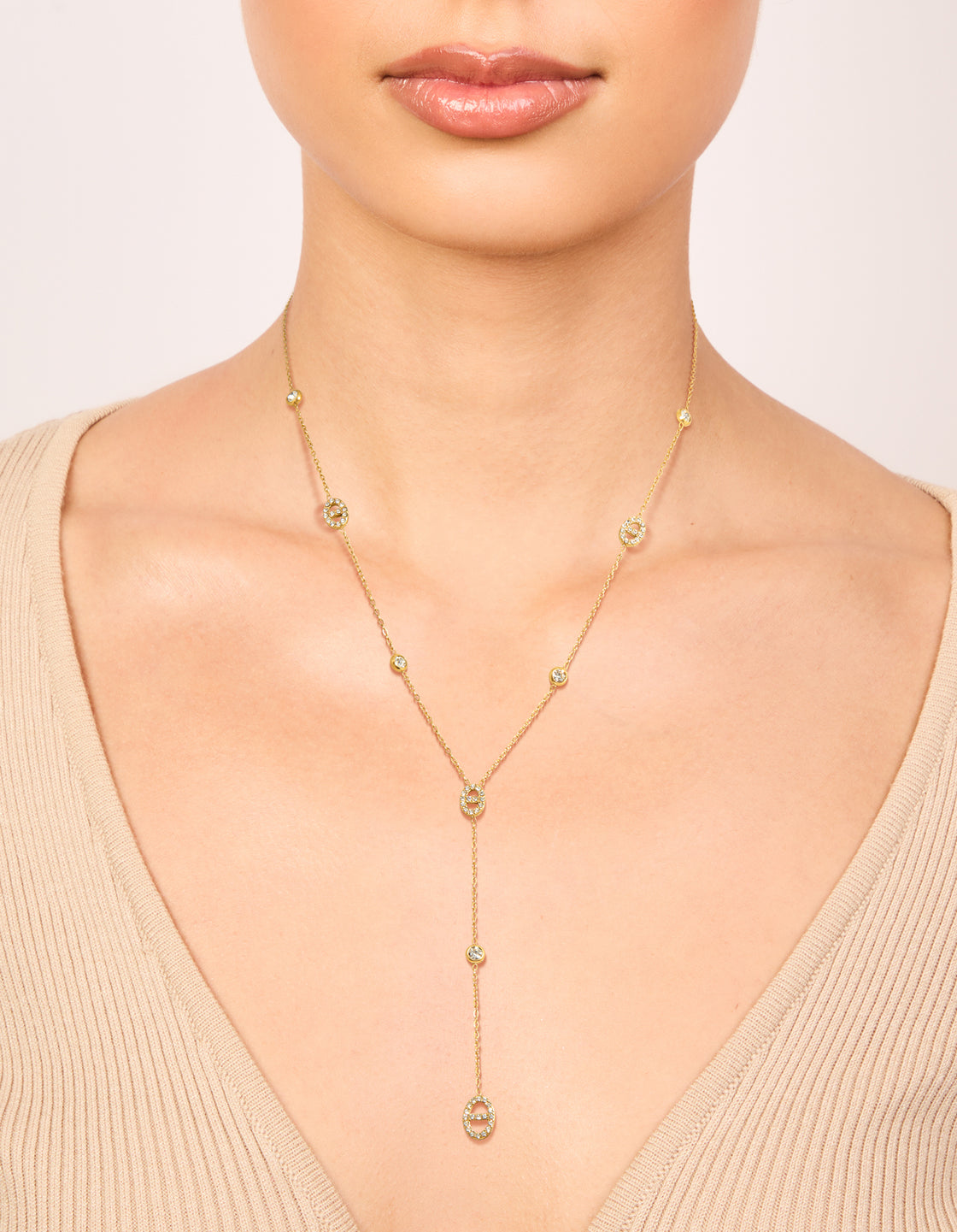 Discover this waterproof gold plated stainless steel cubic zirconia Y-necklace with oval stone on neck view