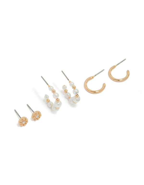 Featuring gold diamante and pearl earrings in a 3-pack hoop and stud closures front view