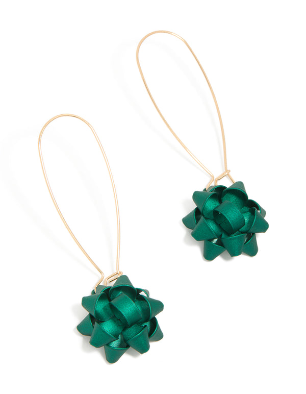 Showcasing statement hook earrings featuring bow accents in teal and gold front view