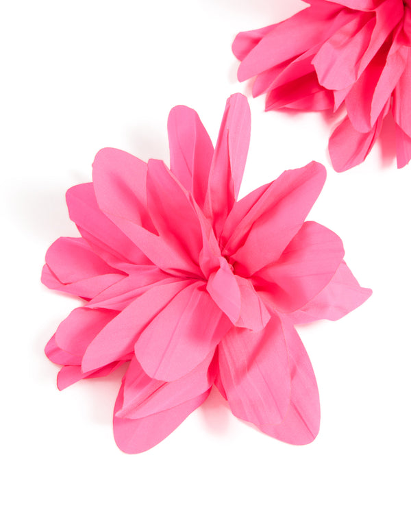 Designed with statement floral fabric flower petal earrings in gold and pink close up view
