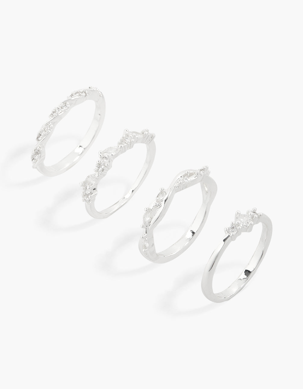 Showcasing silver plated winding stacking rings with cubic zirconia in dainty style, oval stone cut front view