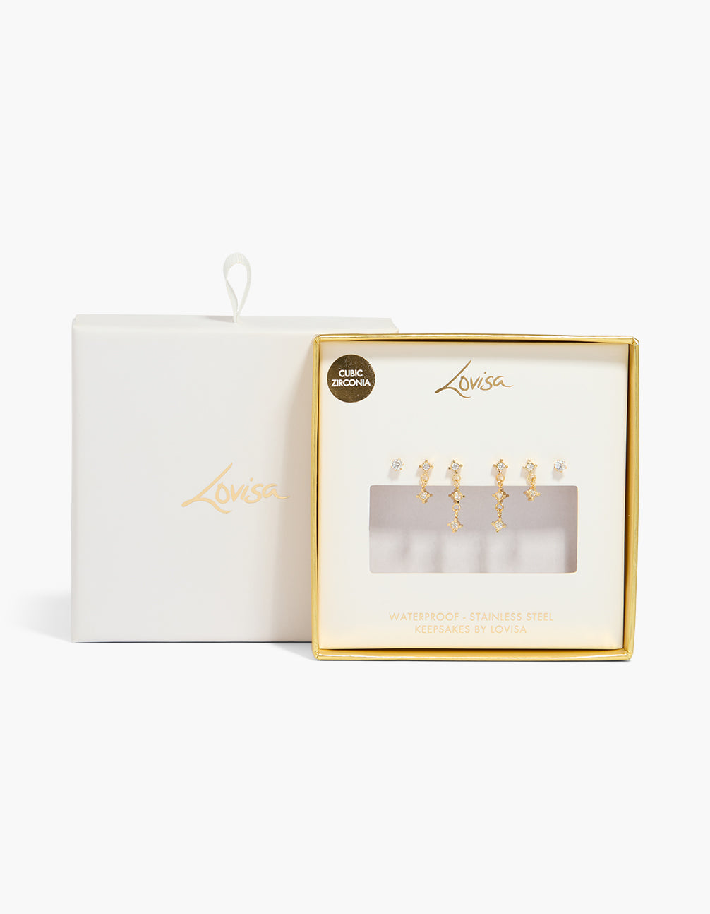 Featuring waterproof gold plated stainless steel cubic zirconia drop earrings in a 3-pack with stud closure shown in a packaging close up view