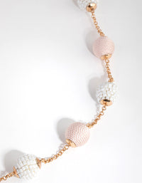 Gold Wrap Bead Station Necklace - link has visual effect only