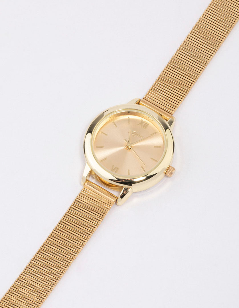 Discover this small simple mesh watch with roman dial look, round shape, analog design, and casual styling for women watch face detail view