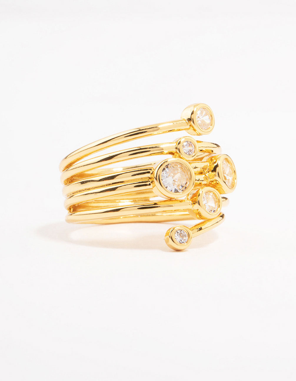 Showcasing a gold plated bezel layered coil ring featuring cubic zirconia side detail view