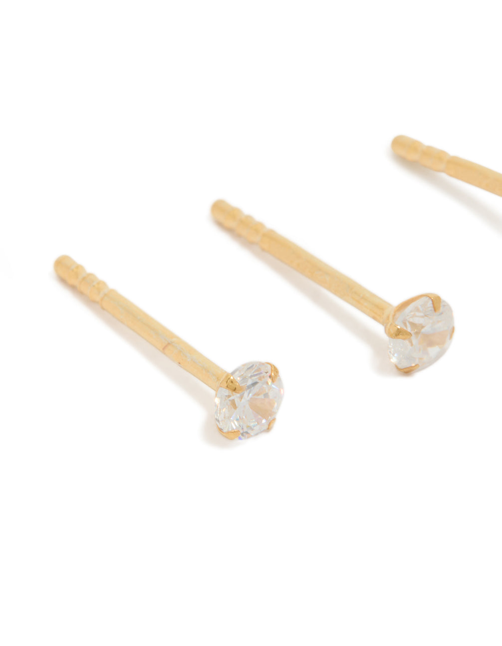 Crafted from gold plated sterling silver mini starburst celestial earrings in a 2-pack close up view