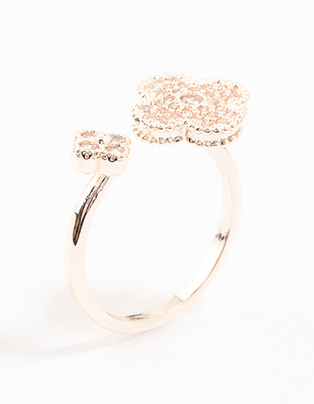 Crafted with floral design, this rose gold open flower ring in side detail view