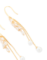 Beautifully crafted gold plated cubic zirconia pearl and leaf drop hook earrings close up view - link has visual effect only