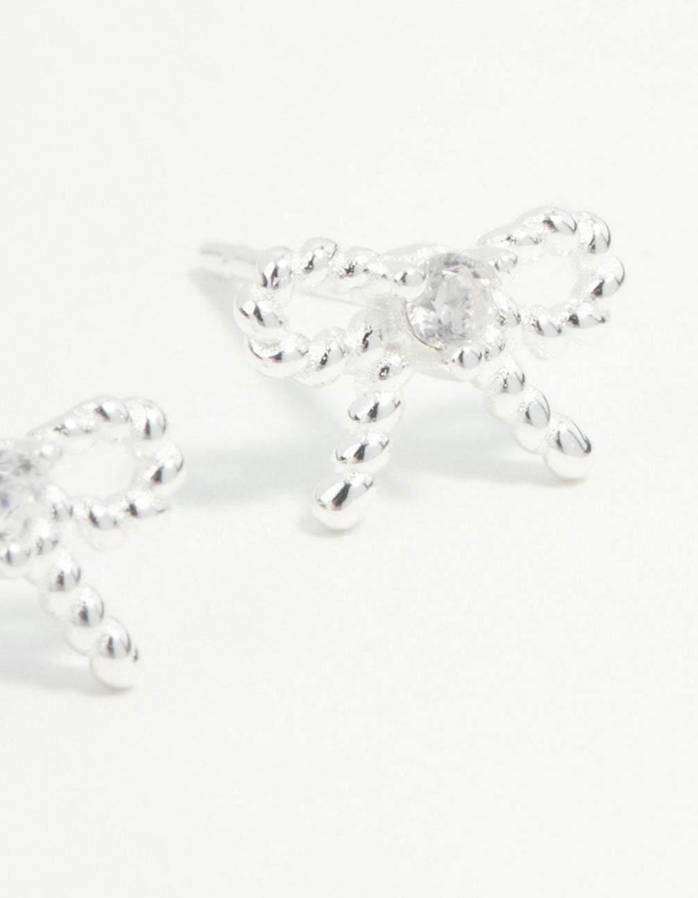 Sterling Silver Textured Bow Stud Earrings