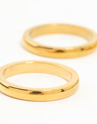 Showcasing waterproof gold plated stainless steel band rings in a 3-pack close up view - link has visual effect only