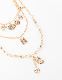 Gold Heart & Textured Charm Layered Necklace - link has visual effect only