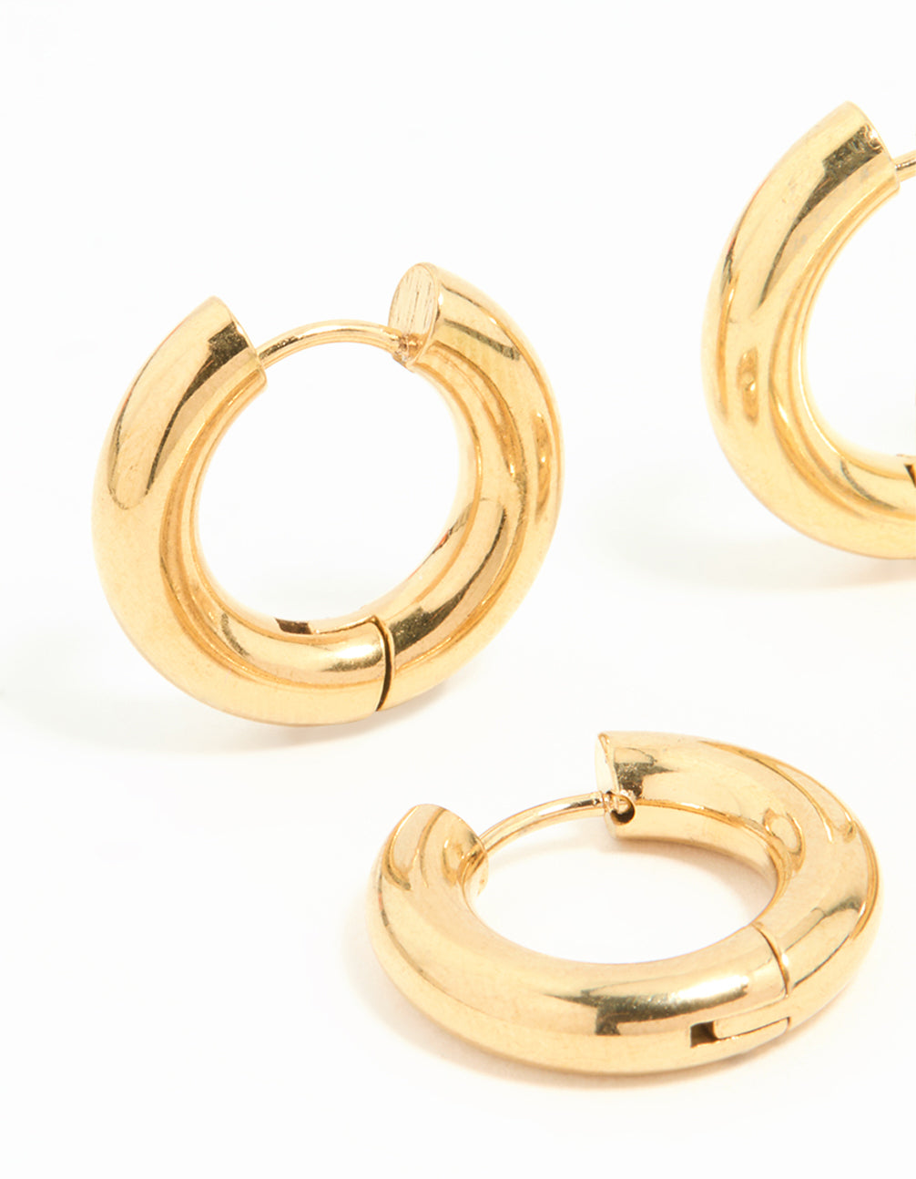 Crafted from waterproof gold plated stainless steel tube hoop earrings in a 2 pack close up view