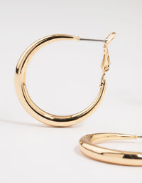 Gold Smooth Huggie Hoop Earrings 3-Pack - link has visual effect only