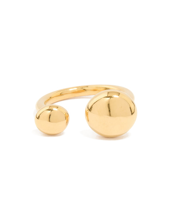 Display of a waterproof double ball ring in gold plated stainless steel with dainty styling close up view