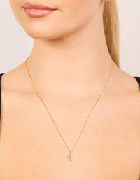 Elegant gold plated sterling silver cubic zirconia cross necklace on neck view - link has visual effect only
