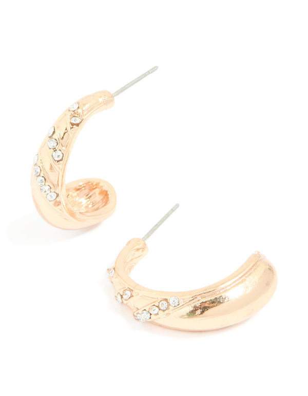 Beautifully crafted gold diamante pear open hoop earrings featuring white stone cut details front view