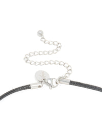 Featuring a waterproof stainless steel organic pendant necklace with black cord and silver closure clasp detail view - link has visual effect only