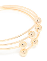 Gold Ball Layered Bangle - link has visual effect only