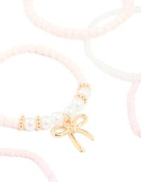 Kids Beaded Pearl Bow Stretch Bracelets 7-Pack - link has visual effect only