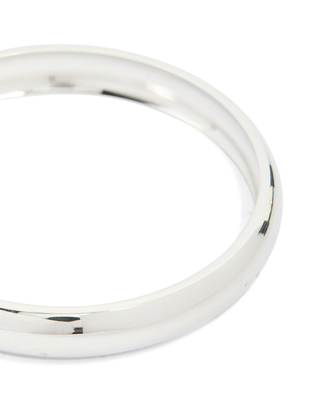 Featuring a waterproof stainless steel round smooth bangle in silver close up view