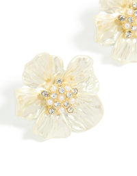 Highlighting statement flower earrings in gold plated finish with pearl and diamante embellished center close up view - link has visual effect only