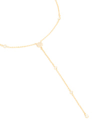 Featuring a gold plated cubic zirconia Y-necklace close up view - link has visual effect only