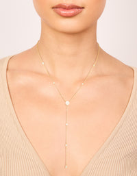 Showcasing a gold plated cubic zirconia Y-necklace on neck view - link has visual effect only