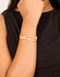Beautifully crafted gold plated organic open wave wrist cuff on wrist view - link has visual effect only