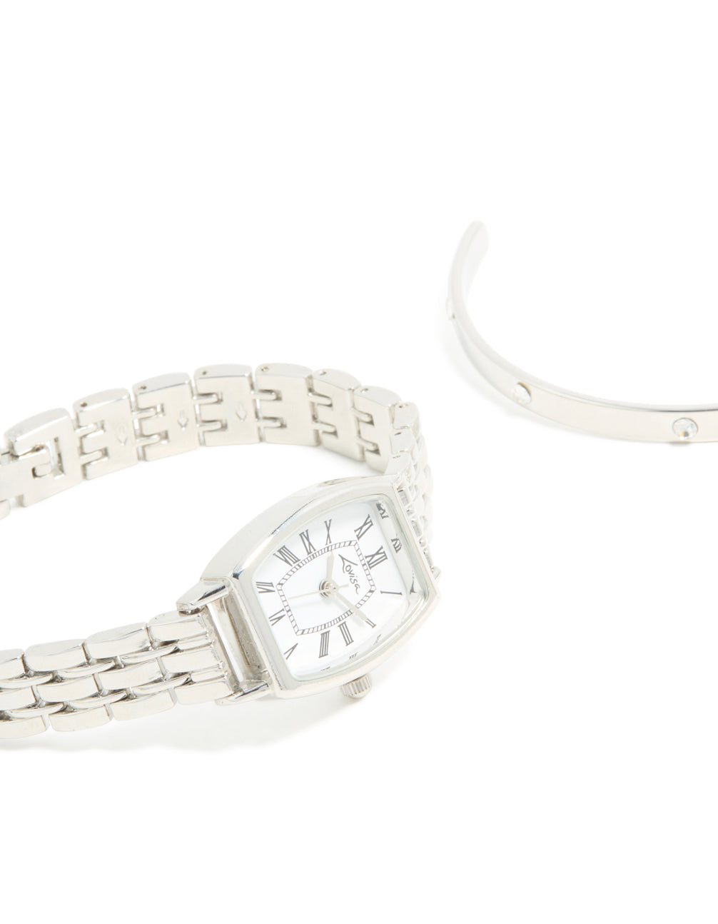 Crafted women's casual analog watch and wrist cuff set with white dial featuring roman numerals, link band in silver watch face detail view