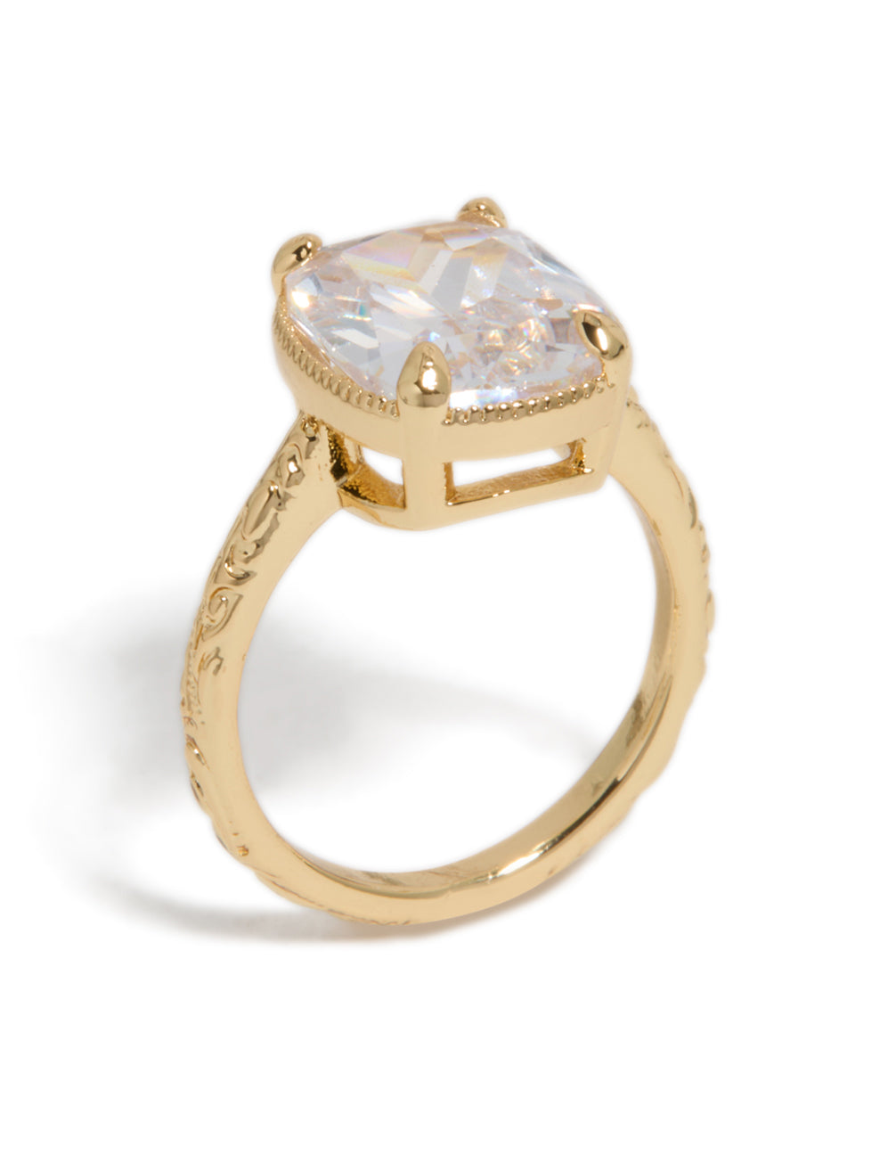 Highlighting a gold plated vintage cubic zirconia ring with crystal and statement design close up view