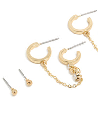 Elegant gold plated cubic zirconia huggie and chain earrings in a 5-pack featuring crystal embellishments and mixed hoop and stud closures close up view - link has visual effect only