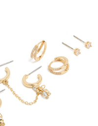 Elegant gold plated cubic zirconia huggie and chain earrings in a 5-pack featuring crystal embellishments and mixed hoop and stud closures close up view - link has visual effect only