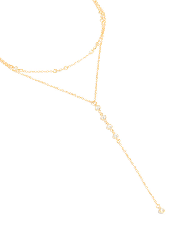 Showcasing a cubic zirconia bezel layered Y-necklace with ball accents crafted from gold plated materials in a dainty statement style front view