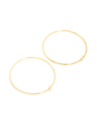 Featuring gold plated cubic zirconia rectangle and teardrop bangles in a 2-pack accents front view - link has visual effect only