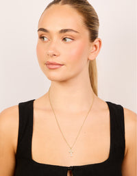 Gold Plated Cubic Zirconia Baguette Cross Necklace - link has visual effect only