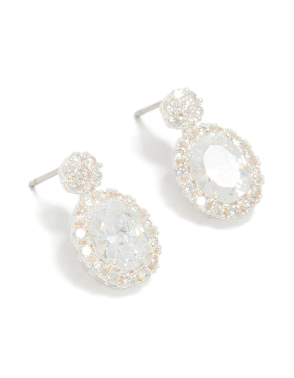 Beautiful silver plated oval cubic zirconia medium drop earrings with clear accents front view