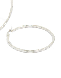 Crafted from surgical steel textured hoop earrings in 40 MM with silver closure post detail view - link has visual effect only