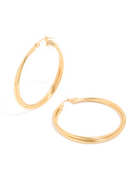Gold plated surgical steel crossover hoop earrings in 40 MM front view - link has visual effect only