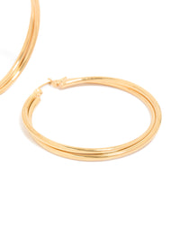Crafted from surgical steel, these gold plated crossover hoop earrings in 40 MM post detail view - link has visual effect only