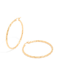 Showcasing gold plated surgical steel textured hoop earrings in 40 MM front view - link has visual effect only