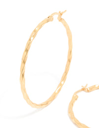 Featuring gold plated surgical steel textured hoop earrings in 40 MM close up view - link has visual effect only